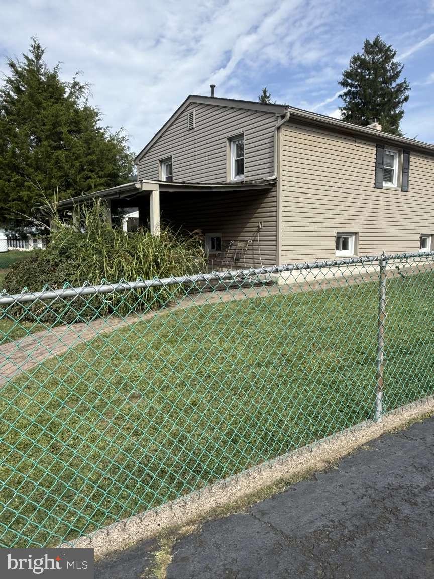 1839 Byberry Road Bensalem, PA 19020 - Photo 3 of 24 a front view of a house with a garden