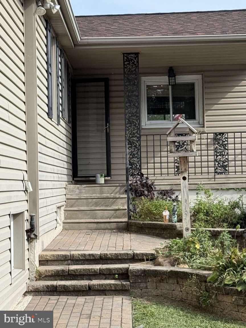 1839 Byberry Road Bensalem, PA 19020 - Photo 4 of 24 a front view of a house with a porch