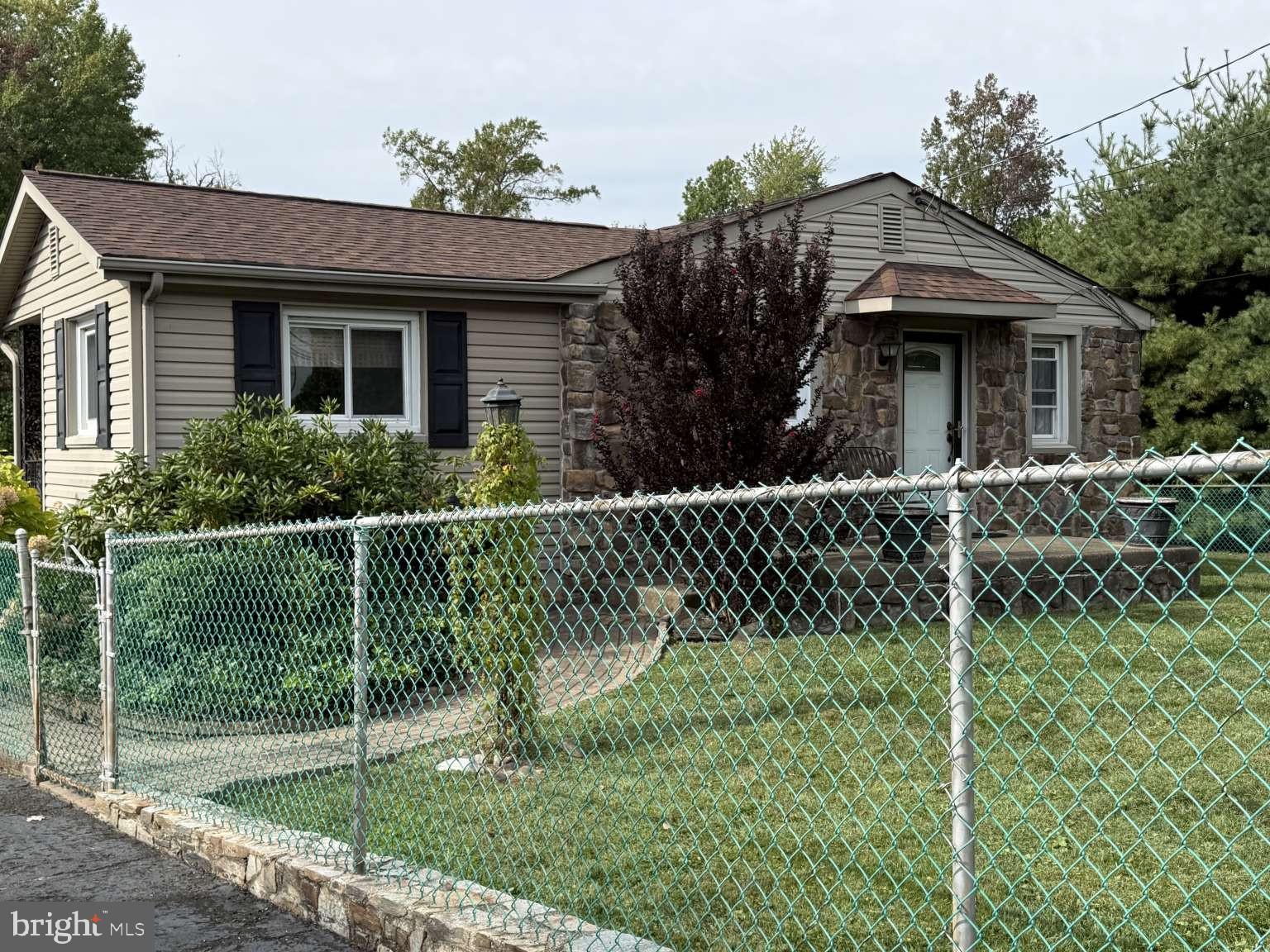 1839 Byberry Road Bensalem, PA 19020 - Photo 5 of 24 a house view with a garden