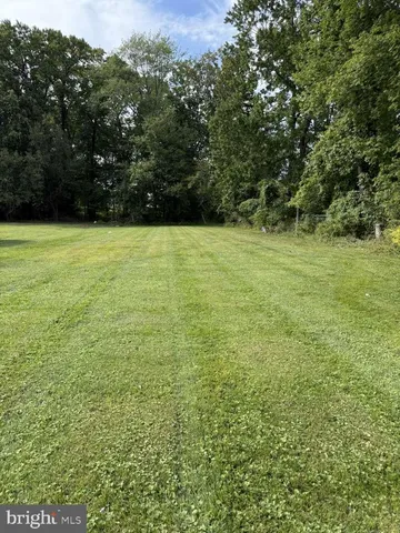 a view of outdoor space and yard