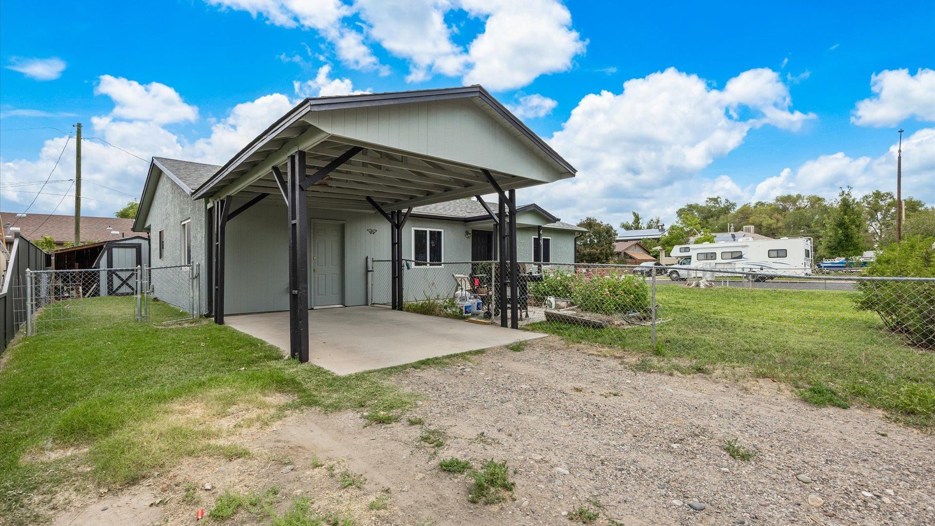 419 South Ash Street Fruita, CO 81521 - Photo 2 of 18 a view of a house with a yard