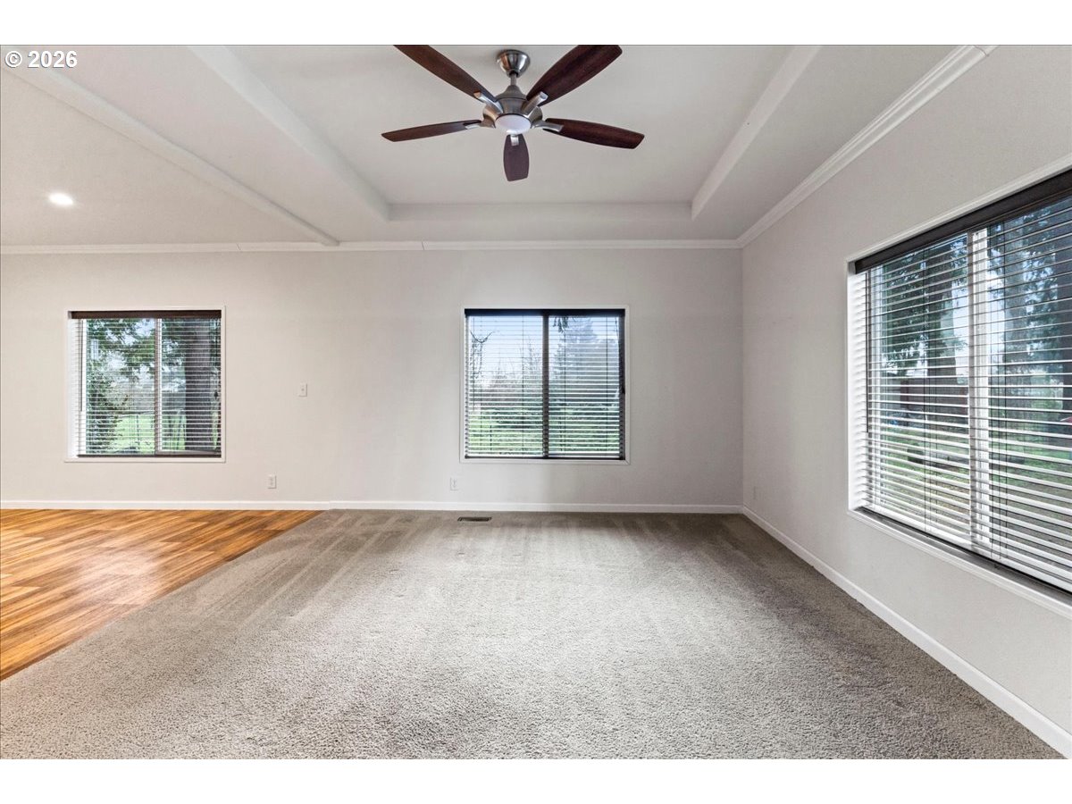7136 South King Street Canby, OR 97013 - Photo 7 of 31 a view of an empty room with a window