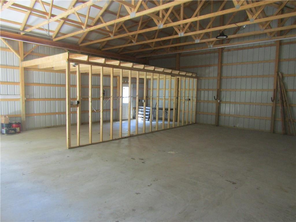 457 Grasser Road Manns Choice, PA 15550 - Photo 16 of 36 a view of an empty room with a garage