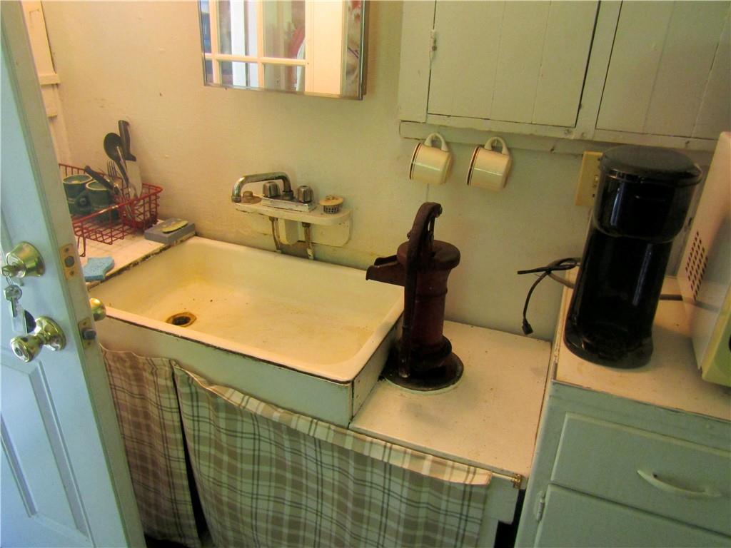 457 Grasser Road Manns Choice, PA 15550 - Photo 26 of 36 a bathroom with a sink