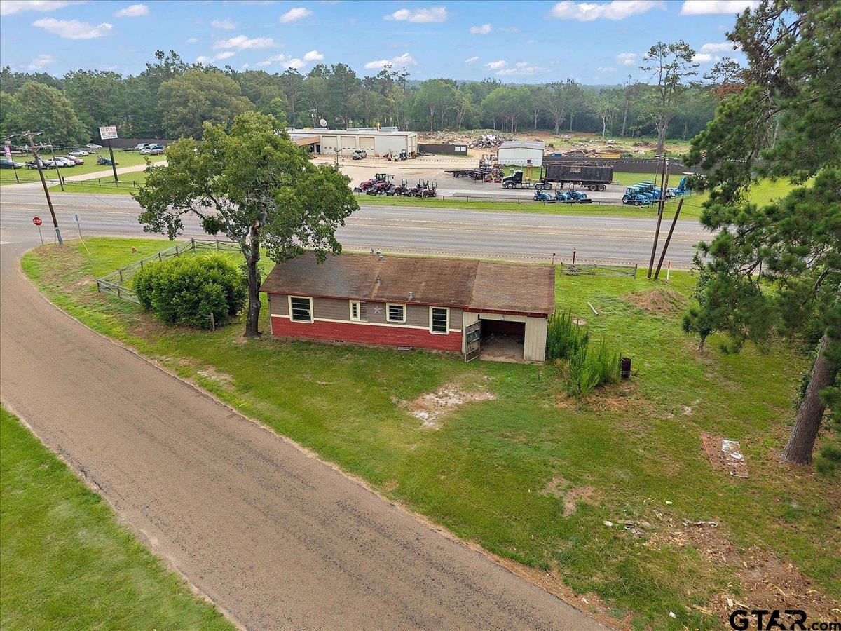 1535 North Dickinson Drive Rusk, TX 75785 - Photo 7 of 18 an aerial view of a house with a garden and swimming pool