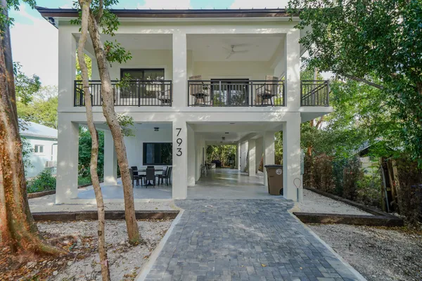 a view of a building with a porch