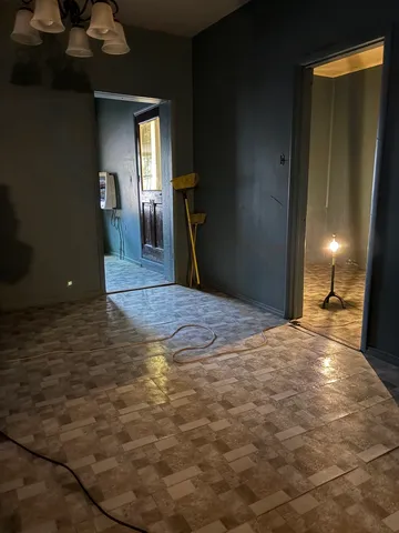 a view of a livingroom with wooden floor