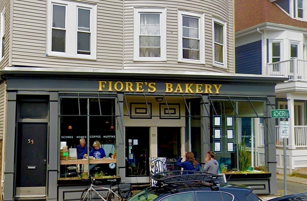 29 Goldsmith Street, Unit 3 Boston, MA 02130 - Photo 18 of 21 a view of a food market with retail stalls