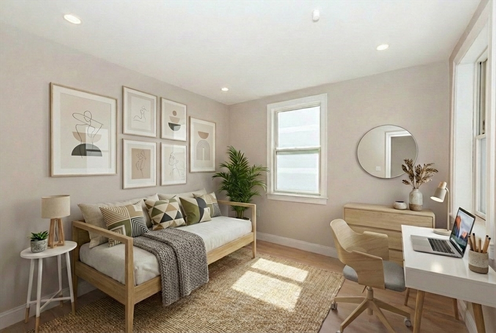 29 Goldsmith Street, Unit 3 Boston, MA 02130 - Photo 7 of 21 a bedroom with bed and a window