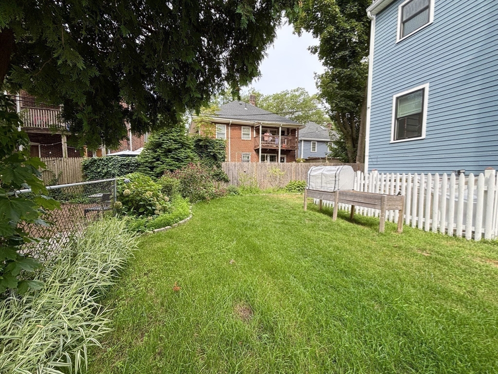 29 Goldsmith Street, Unit 3 Boston, MA 02130 - Photo 10 of 21 a view of a house with a yard and sitting area