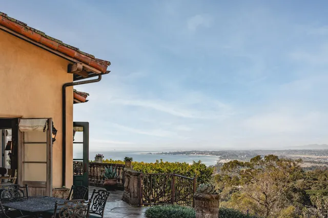 a view of a house with a street
