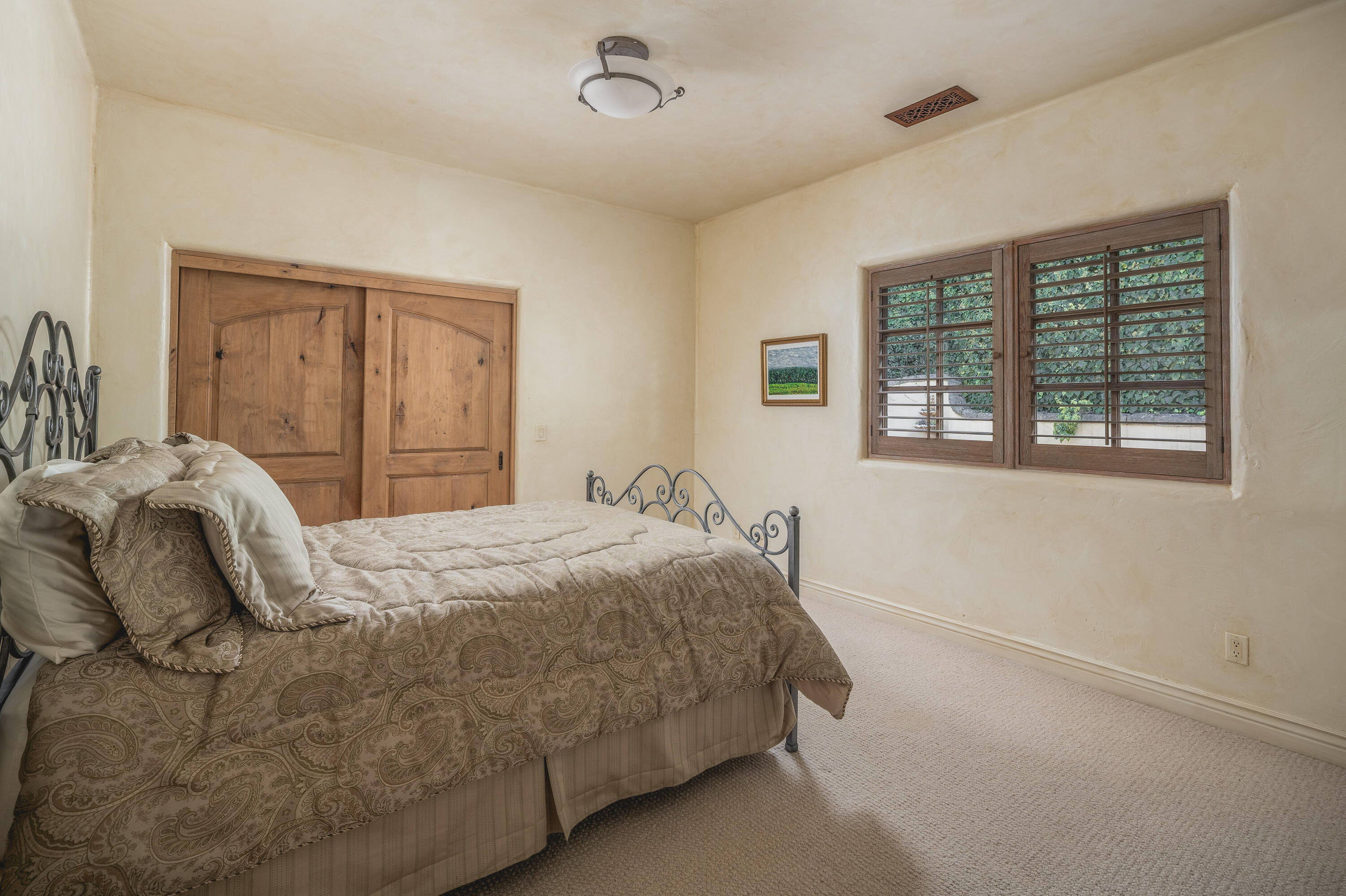 4020 Cuervo Avenue Santa Barbara, CA 93110 - Photo 25 of 48 a bedroom with a bed and a window