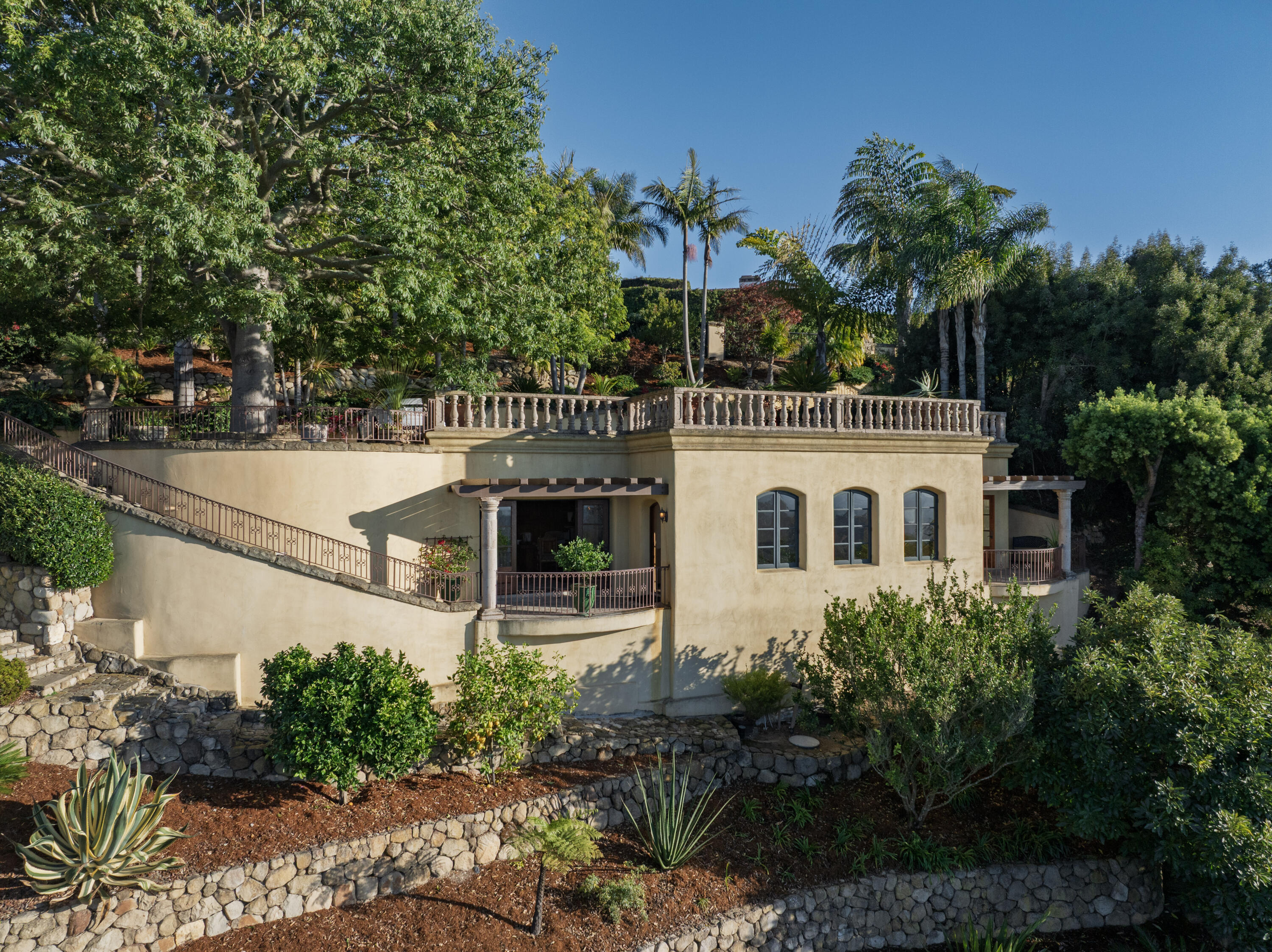 4020 Cuervo Avenue Santa Barbara, CA 93110 - Photo 31 of 48 a front view of a house with a yard