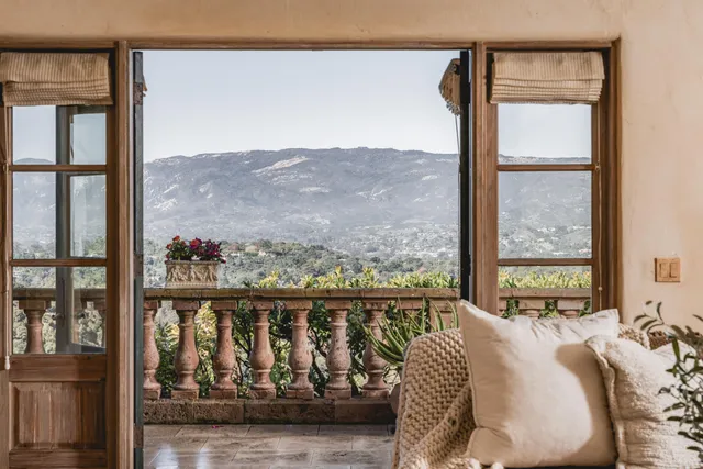 a bath tub sitting next to a window