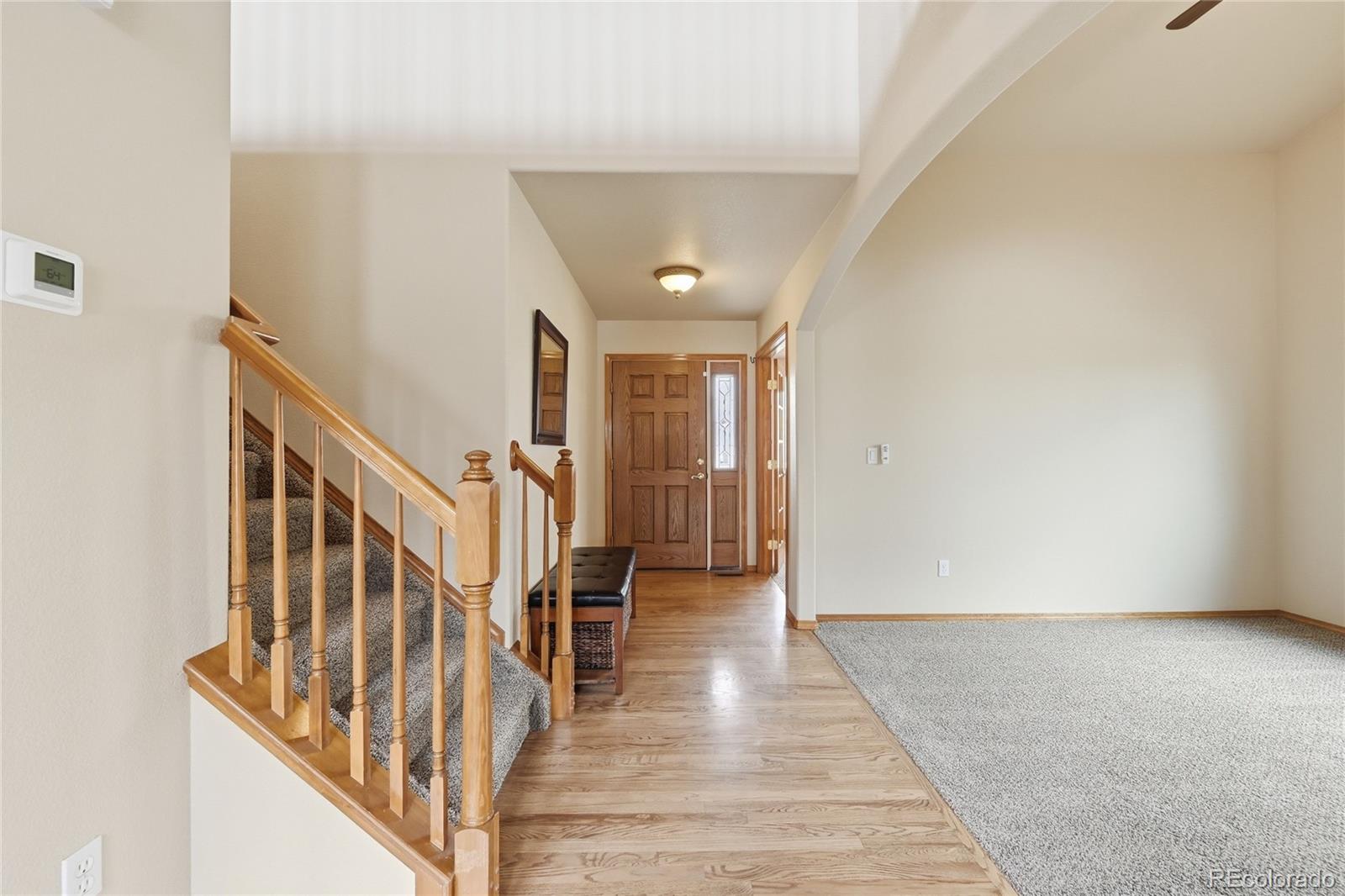 9288 Rockingham Drive Peyton, CO 80831 - Photo 6 of 49 a view of entryway with wooden floor