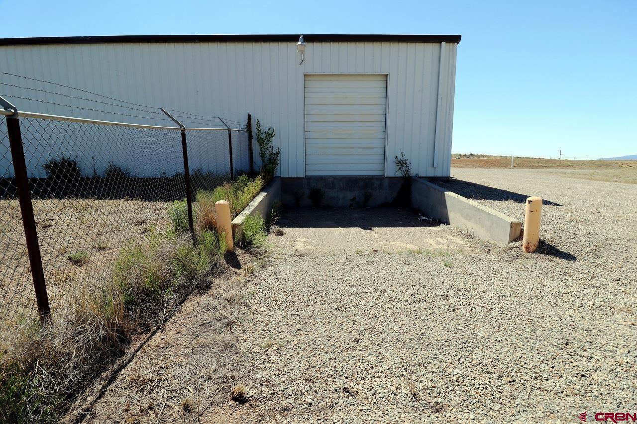 2011 Industrial Road Cortez, CO 81321 - Photo 13 of 16 a view of a backyard with plants