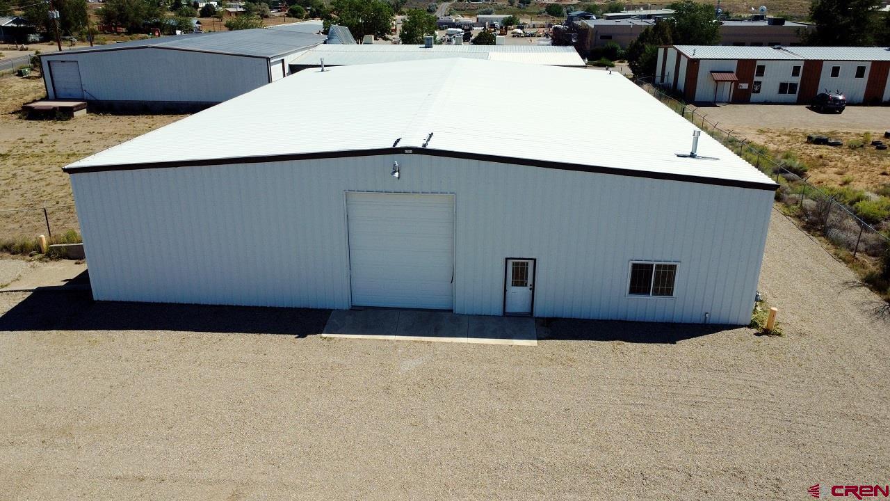 2011 Industrial Road Cortez, CO 81321 - Photo 2 of 16 a view of a house with a roof