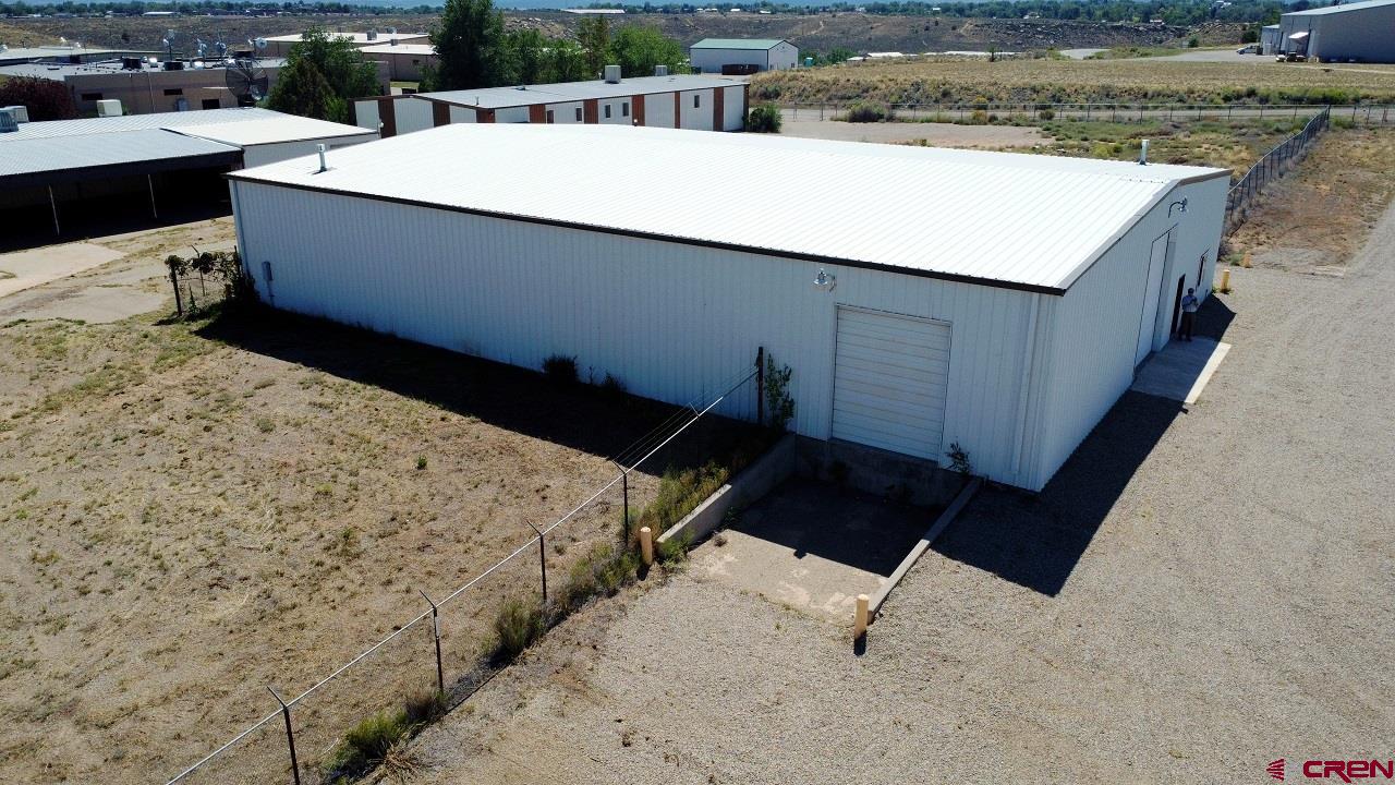 2011 Industrial Road Cortez, CO 81321 - Photo 3 of 16 a view of a terrace with a bench