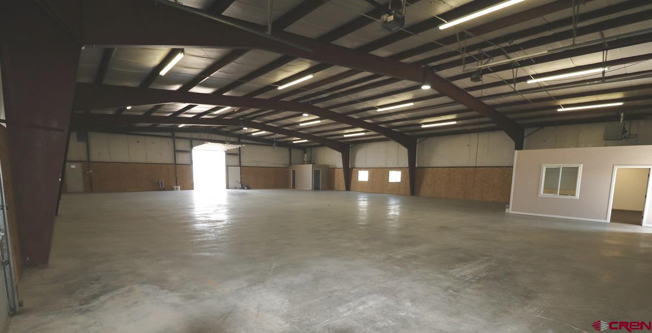 2011 Industrial Road Cortez, CO 81321 - Photo 6 of 16 a view of a room with gym equipment