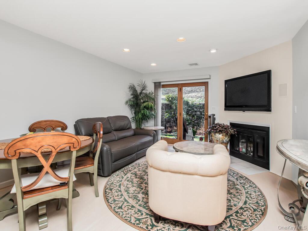 8 Davids Lane Ossining, NY 10562 - Photo 7 of 27 Living area featuring a fireplace and recessed lighting