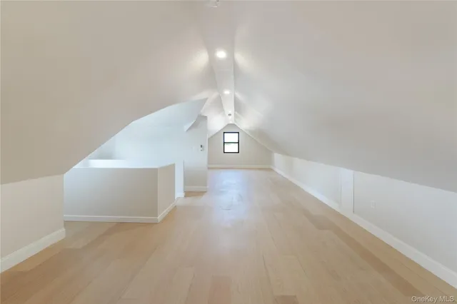 a view of a hallway with staircase
