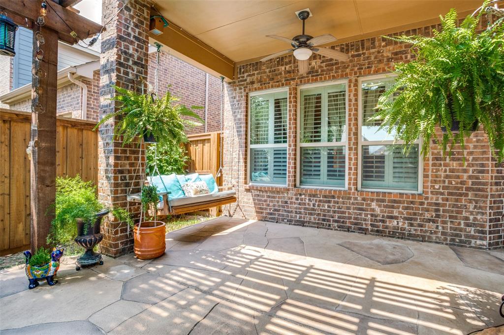 10109 Petrified Tree Lane McKinney, TX 75072 - Photo 22 of 27 a view of a chairs and table in the patio