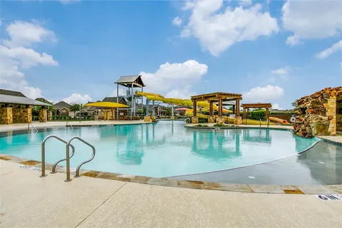 a view of a lake with a house