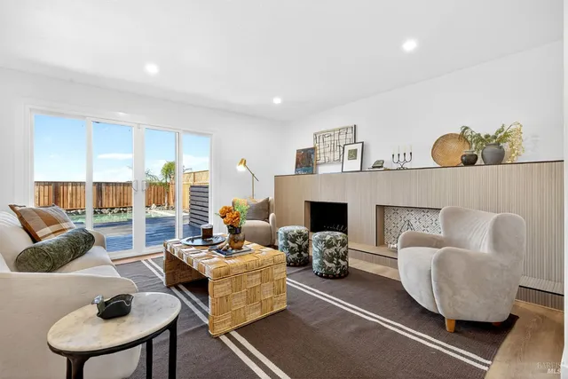 a bathroom with a double vanity sink mirror and shower