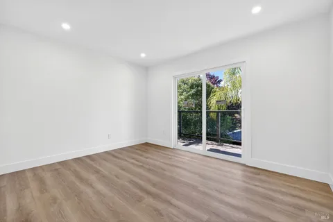a view of backyard with swimming pool and outdoor seating