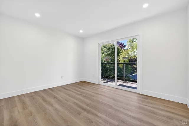 a view of backyard with swimming pool and outdoor seating