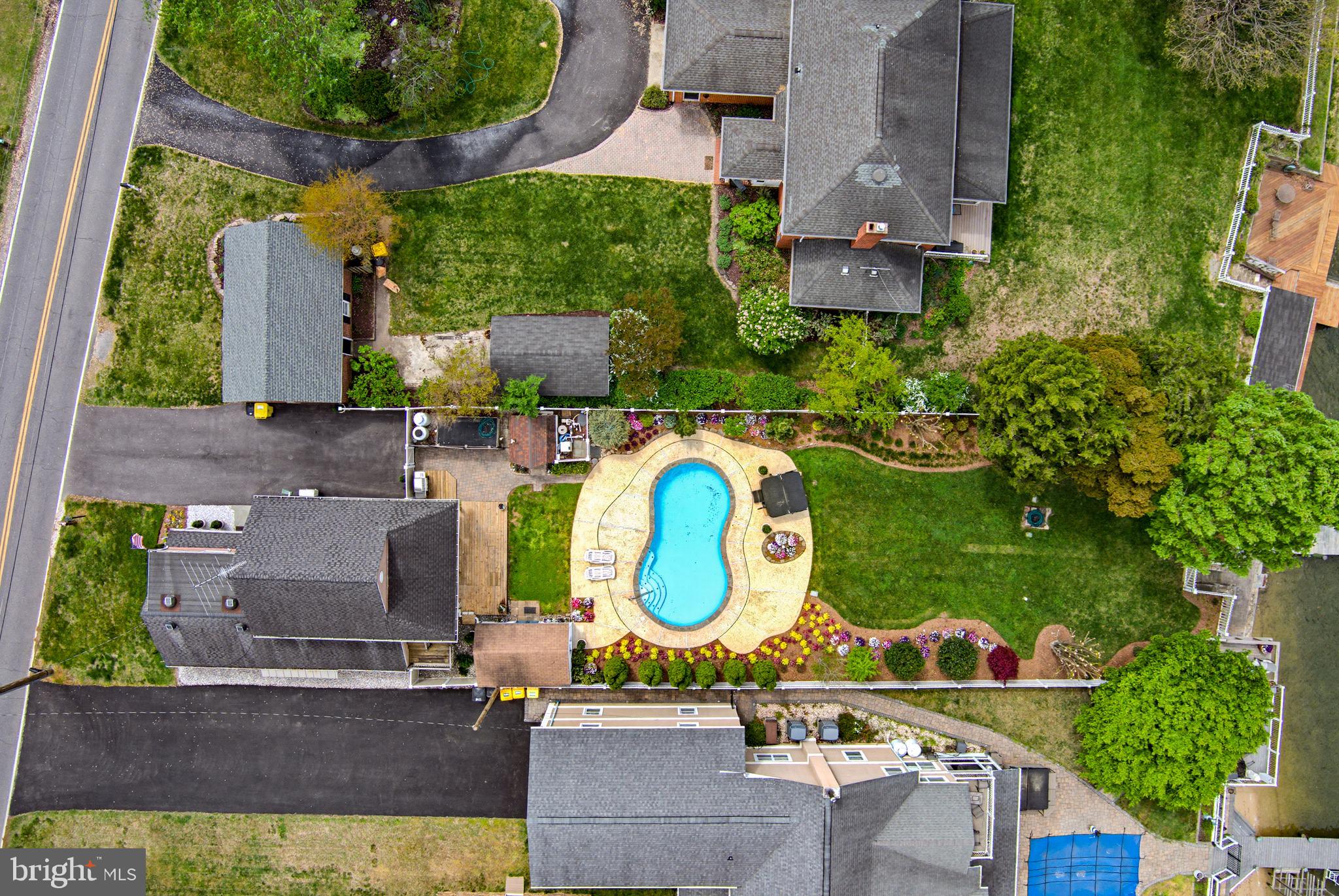2006 Poplar Ridge Road Pasadena, MD 21122 - Photo 57 of 69 an aerial view of a house with swimming pool and outdoor space