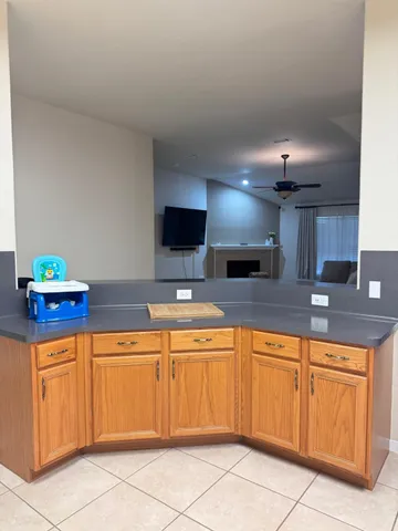 a kitchen with cabinets a sink and a stove