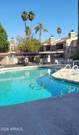 a view of a house with swimming pool