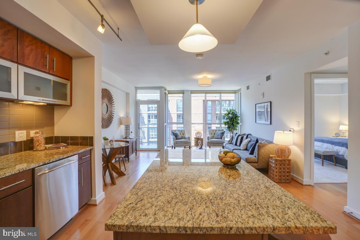 1025 First Street Southeast, Unit 1302 Washington, DC 20003 - Photo 6 of 43 a large kitchen with lots of counter space