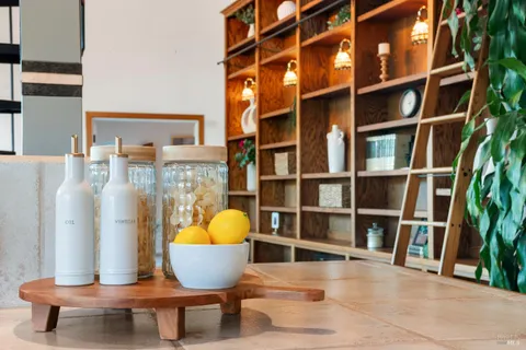 a kitchen with a sink and a large window