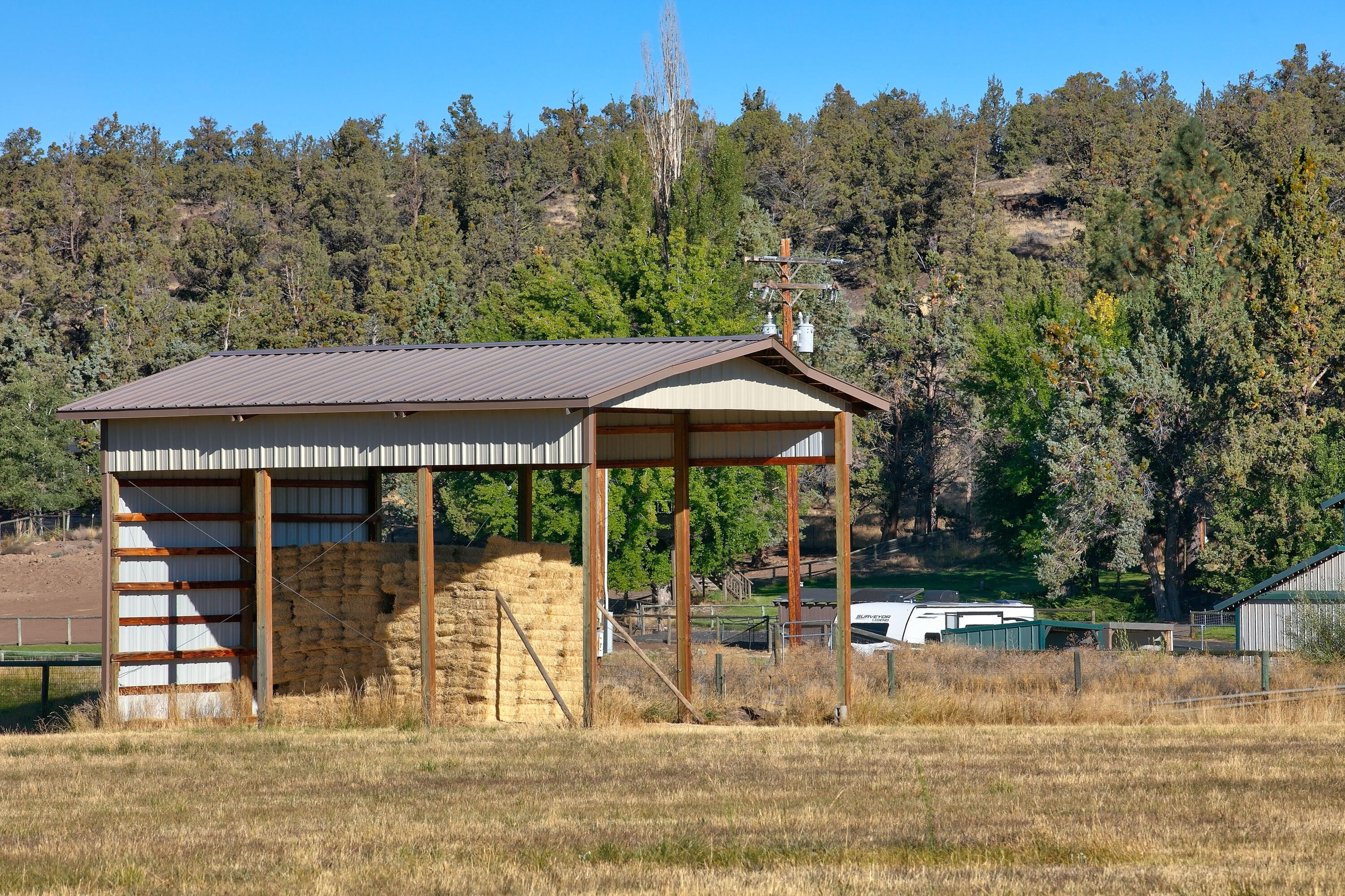 19460 Dayton Road Bend, OR 97703 - Photo 26 of 34 a view of a house with backyard porch and sitting area