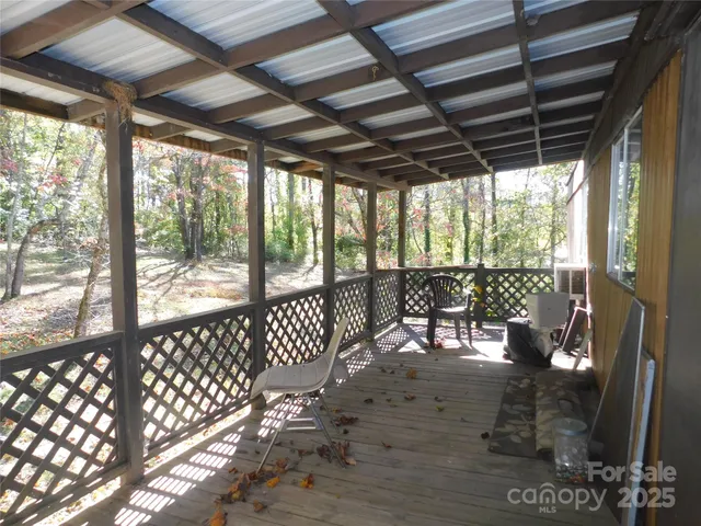 a view of deck and tree