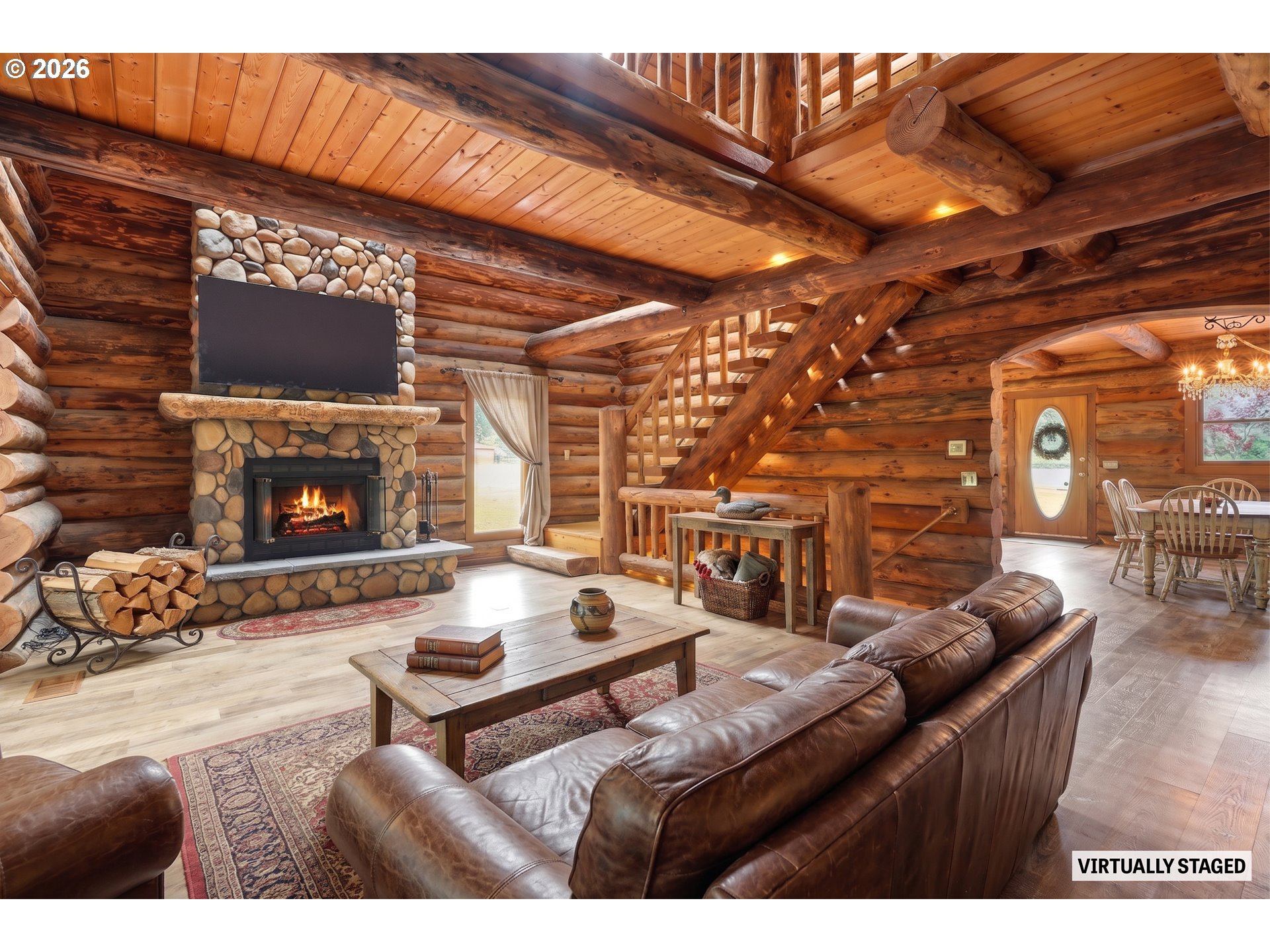 29870 South Dhooghe Road Colton, OR 97017 - Photo 9 of 48 a living room with furniture a fireplace and a flat screen tv