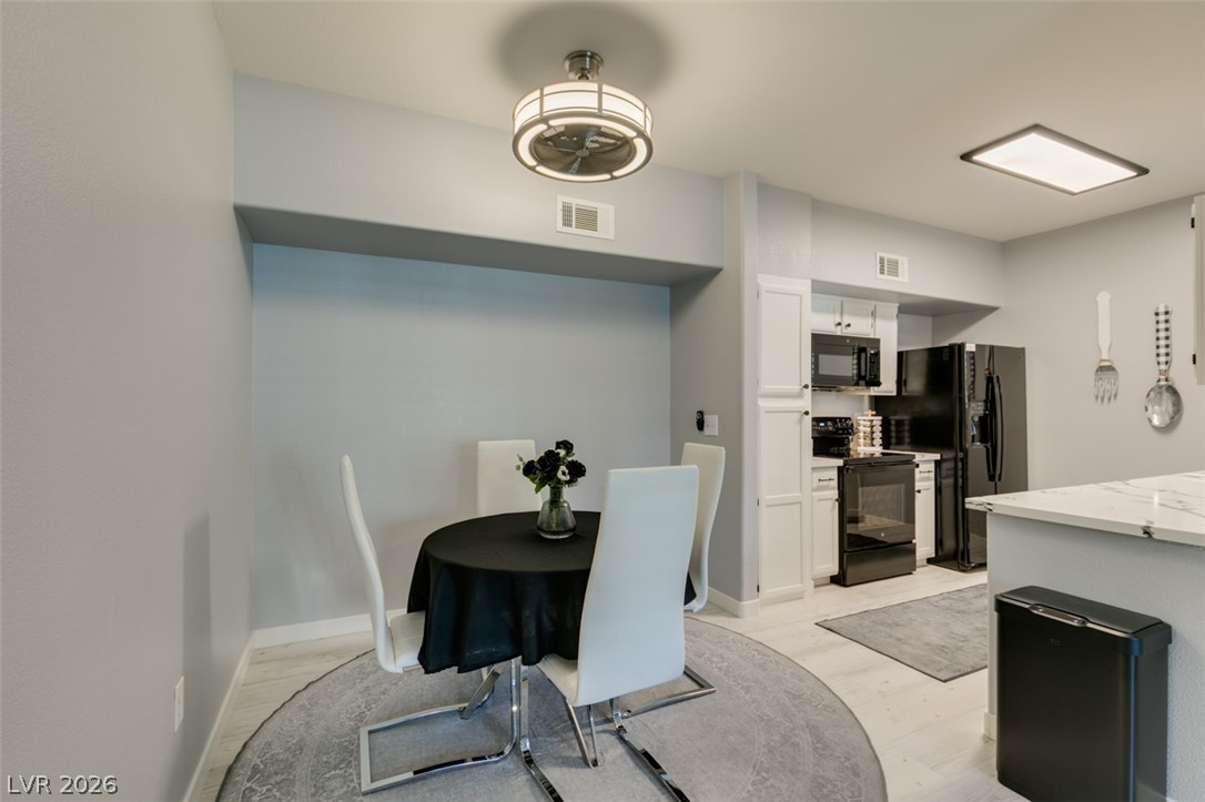7255 West Sunset Road, Unit 1103 Las Vegas, NV 89113 - Photo 22 of 35 Functional kitchen with ample cabinet space, perfect for everyday meals and entertaining.