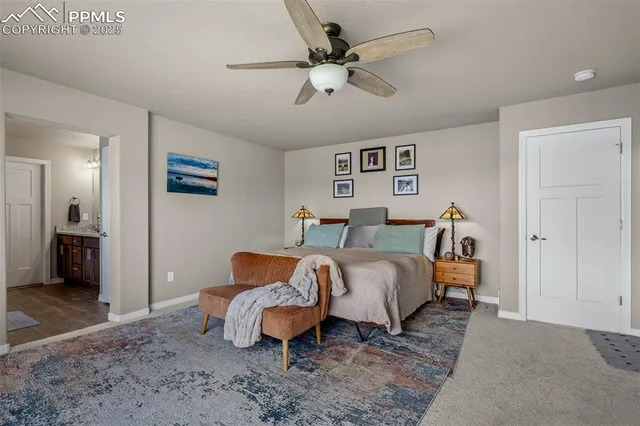 a bed room with a bed and a couch