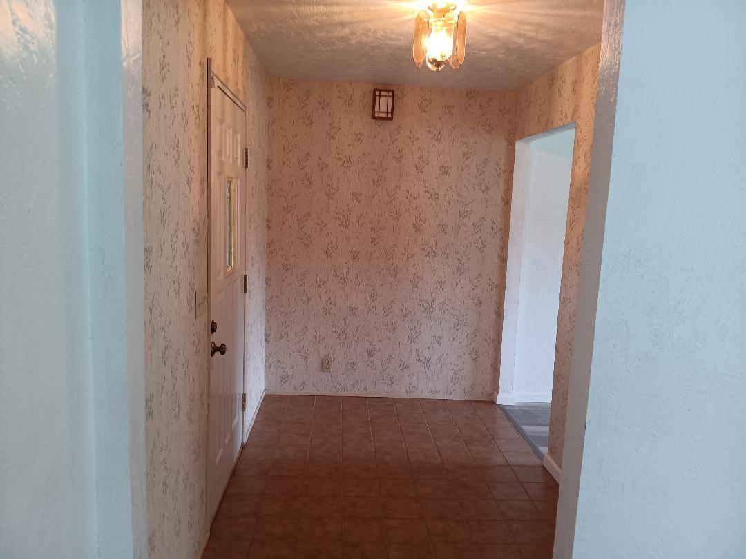19324 Farallon Road Madera, CA 93638 - Photo 8 of 10 a view of a hallway