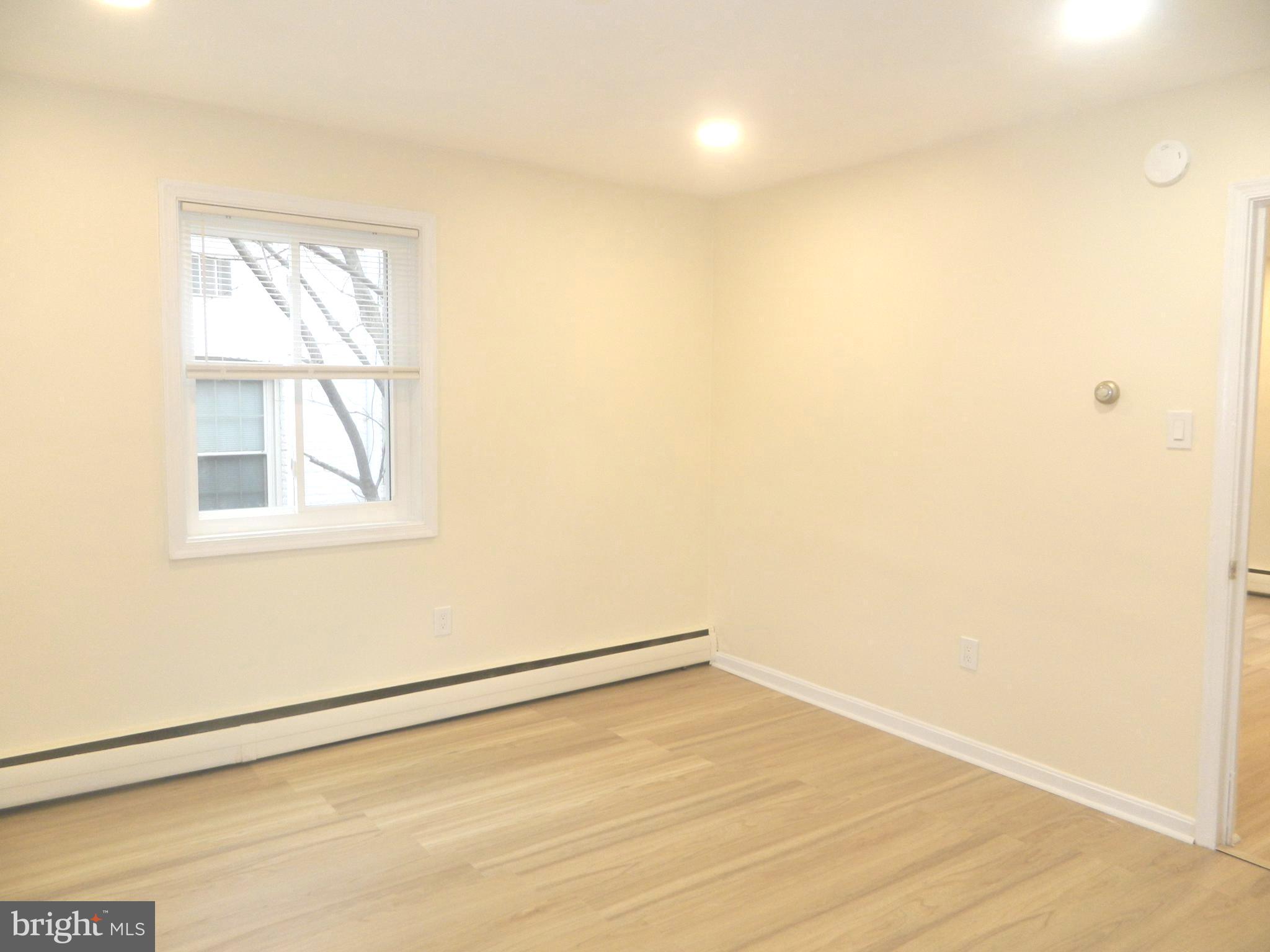 513 12th Street Northeast, Unit 9 Washington, DC 20002 - Photo 19 of 29 an empty room with a window