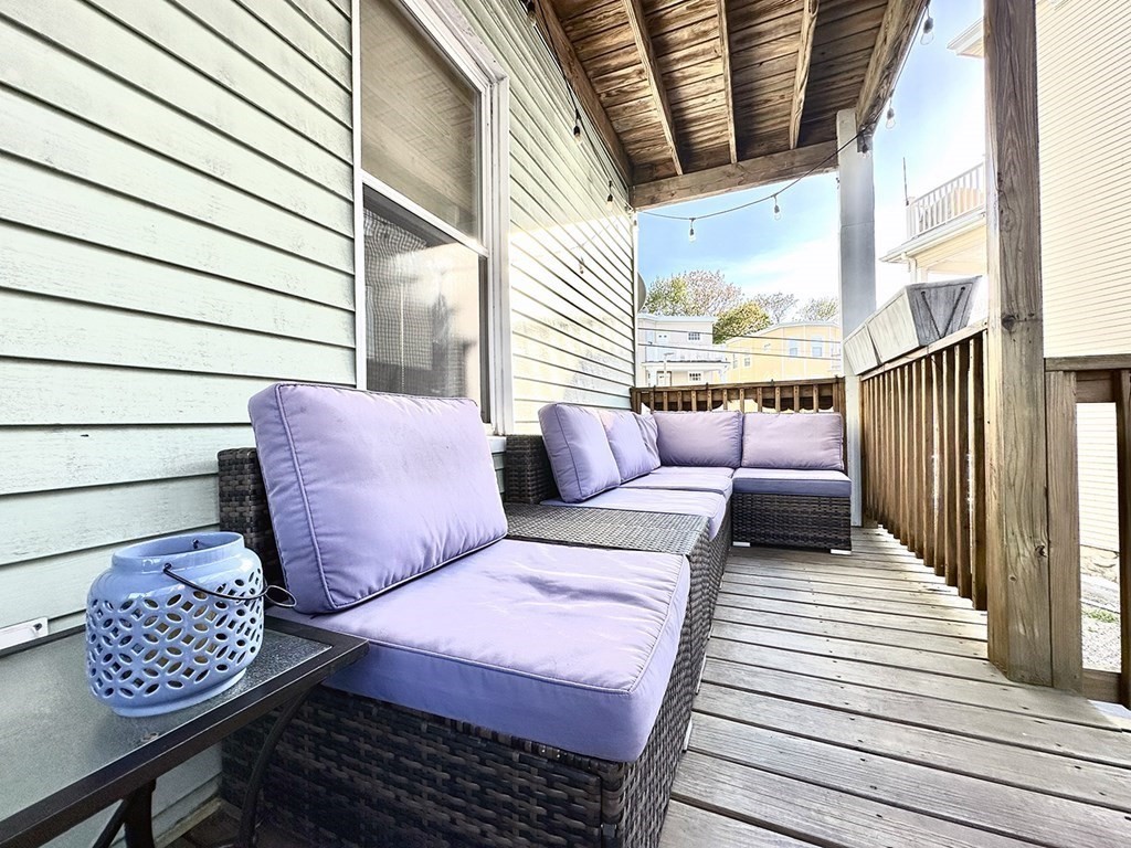 153 Rowe Street, Unit 1 Boston, MA 02131 - Photo 10 of 11 a view of outdoor space with seating