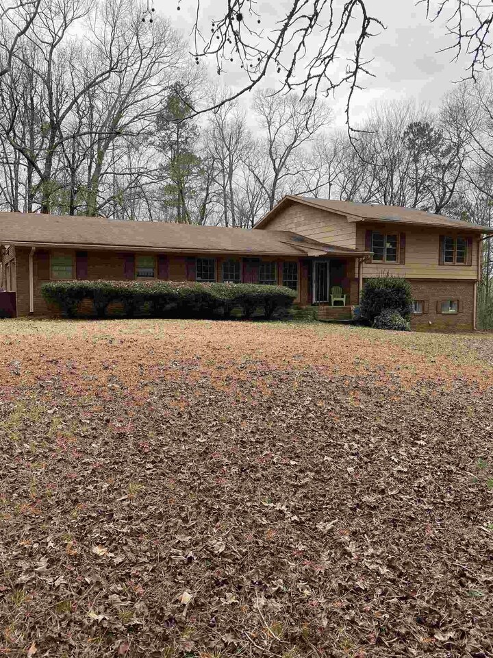 76 Anderson Road Forsyth, GA 31029 - Photo 1 of 1 a front view of a house with a yard
