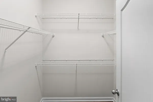 a view of a room with racks on the wall
