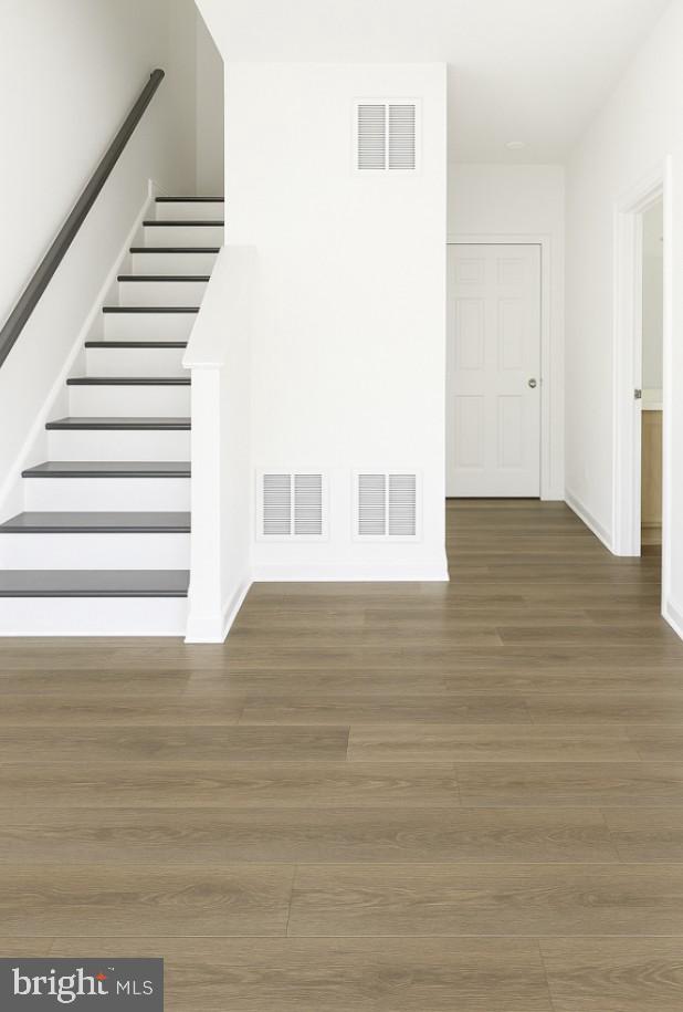 6202 Davinci Street Frederick, MD 21703 - Photo 29 of 36 a view of a big room with wooden floor