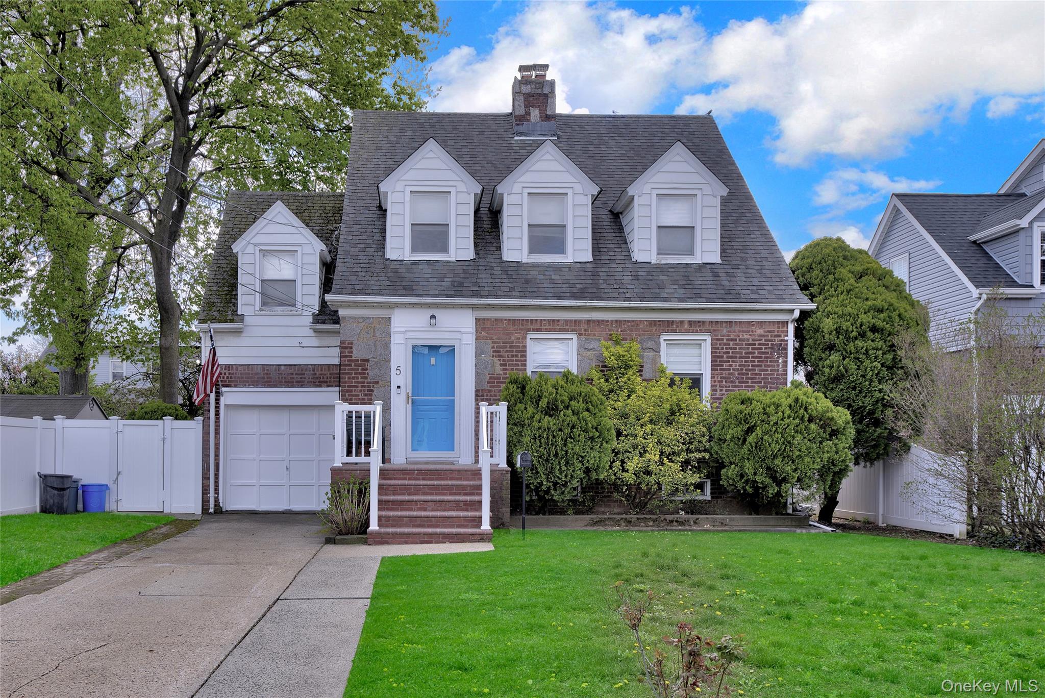 5 Argyle Road Merrick, NY 11566 - Photo 1 of 31 a front view of a house with a yard