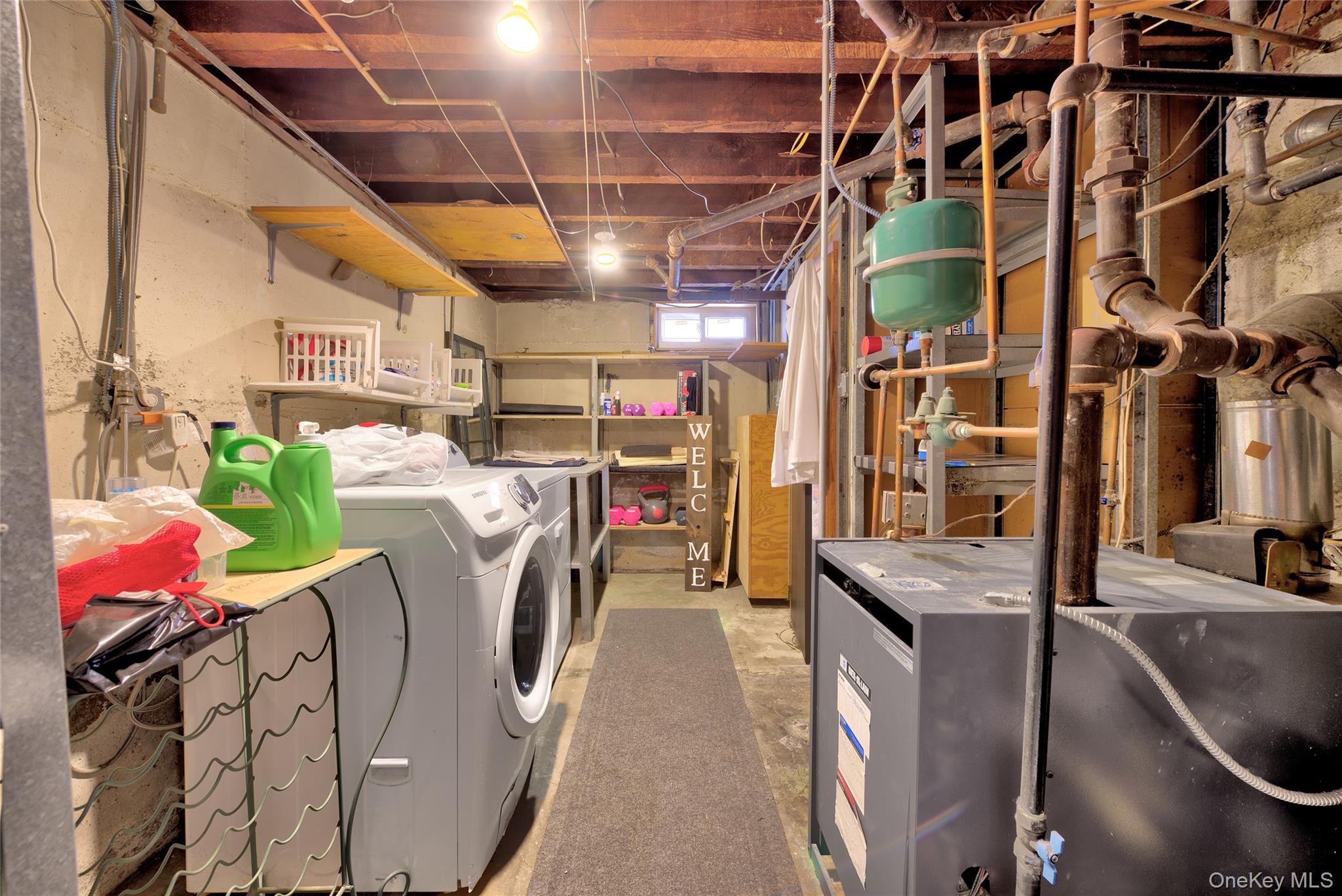 5 Argyle Road Merrick, NY 11566 - Photo 23 of 31 a utility room with dryer and washer