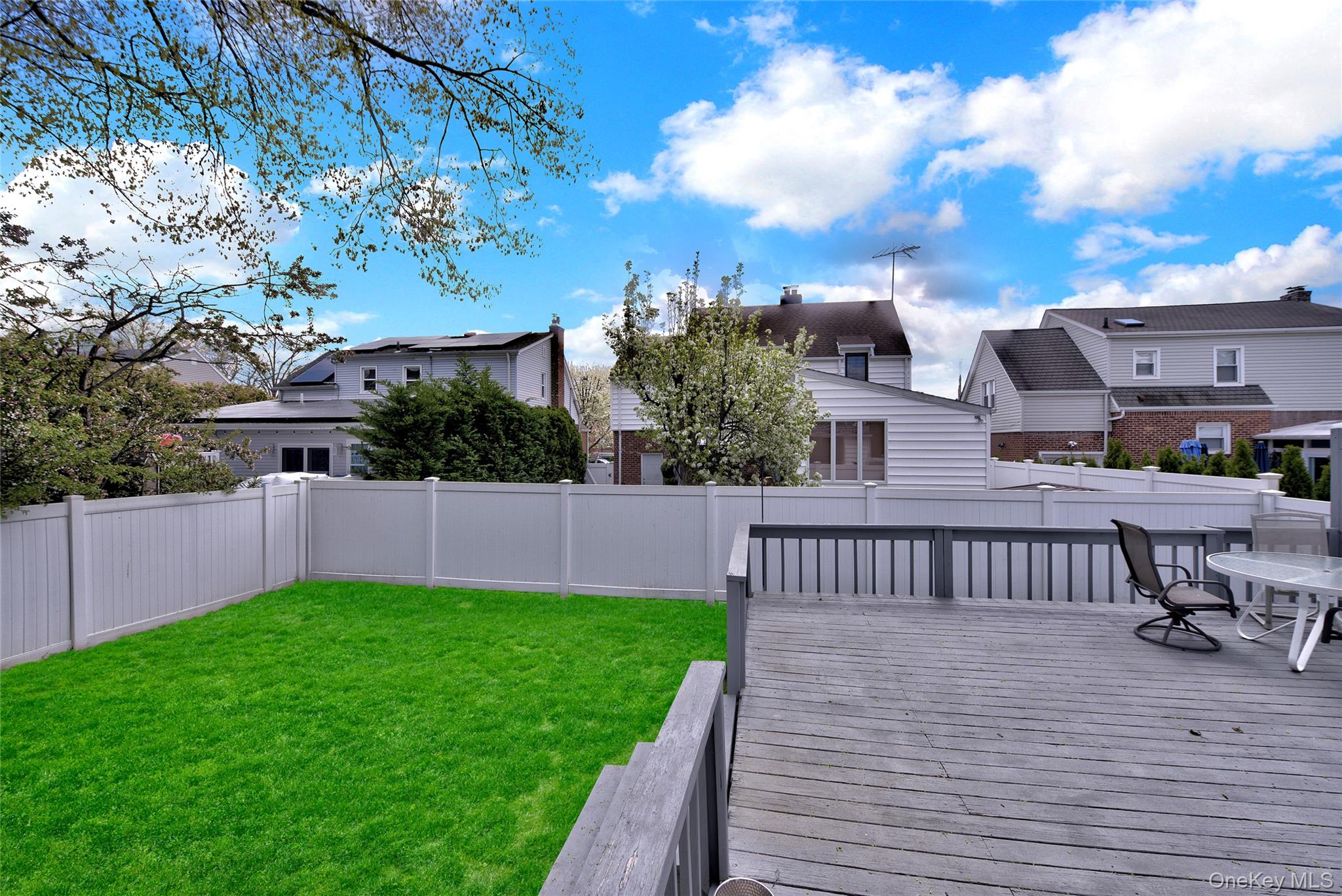 5 Argyle Road Merrick, NY 11566 - Photo 26 of 31 a view of a patio with a yard