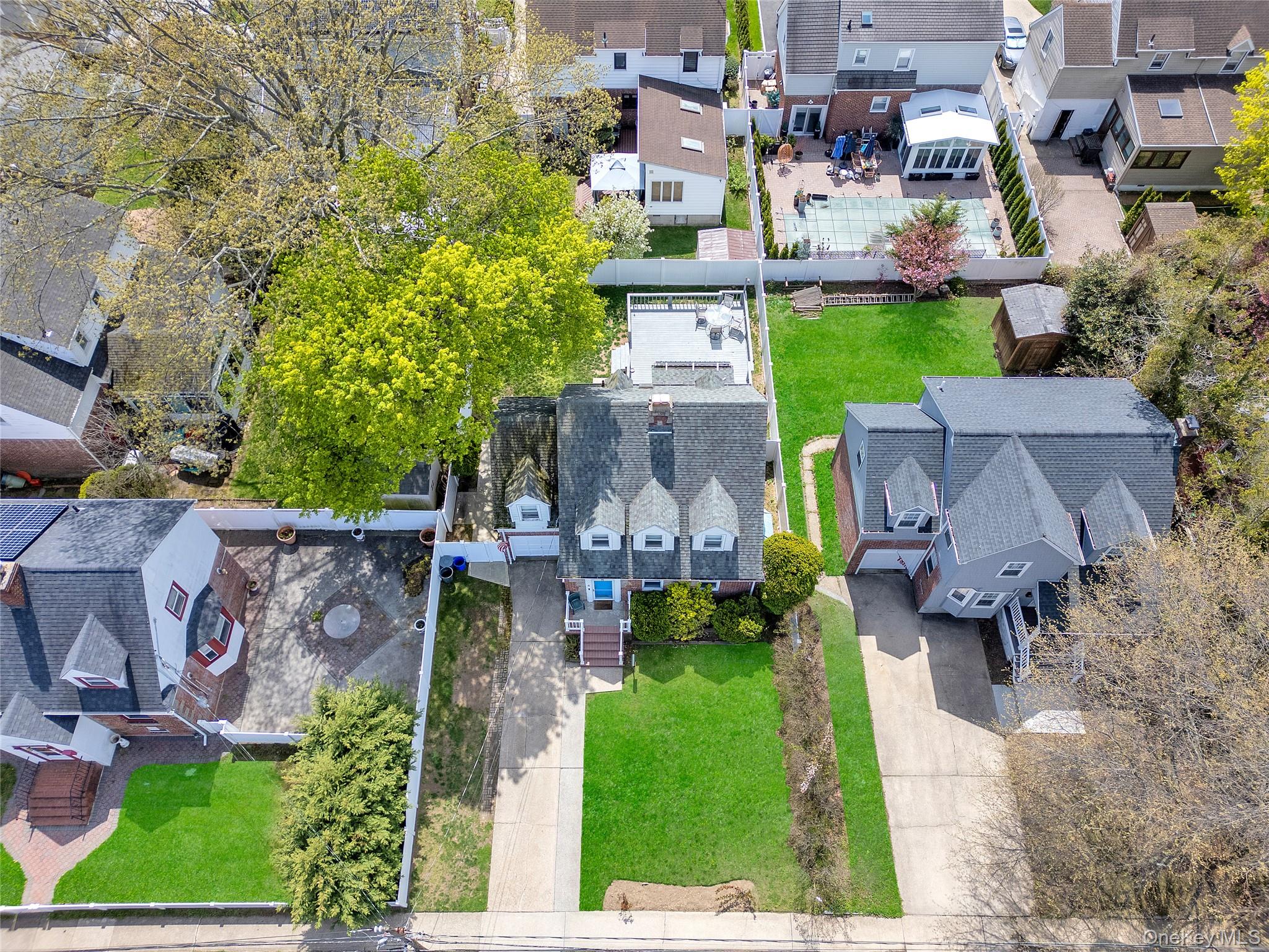 5 Argyle Road Merrick, NY 11566 - Photo 30 of 31 an aerial view of a house with garden space and street view